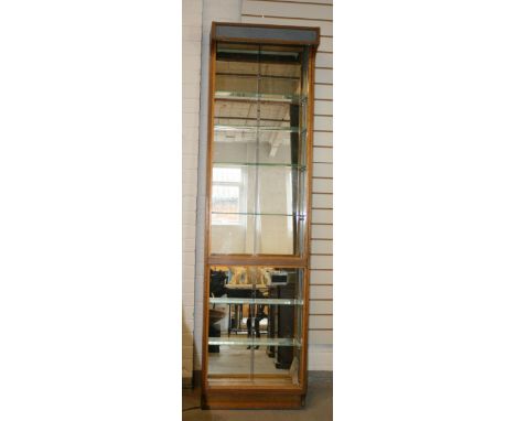 DISPLAY CABINET - a 1950/60s display cabinet with oak body and glass shelving. Includes strip light features. Glass doors mis