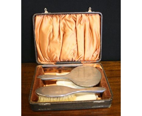 SILVER SET - a boxed Birmingham silver brush and mirror set, machined with gold banding overlay dated 1923 consisting of a br