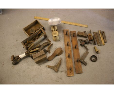 TOOLS - a mixed lot of tools to include shoe lasts, folding rulers, planes, kitchen scales, level, squares, two wood coat rac