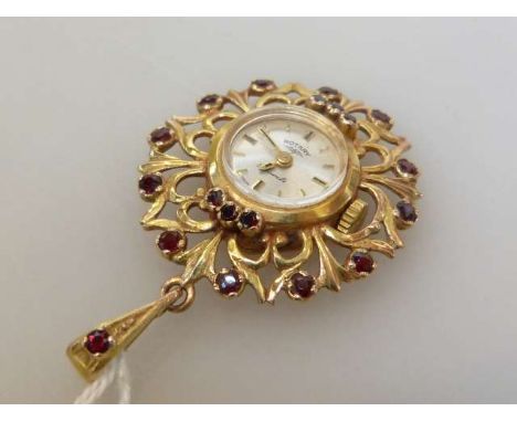 Rotary 9ct gold pendant watch set with red stones, 8 grams