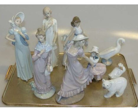 Collection of six Nao figures, swan and signet and Lladro polar bear (9)