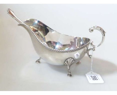 Silver sauce boat, Barker Bros Ltd, Birmingham 1937; and a sterling silver sauce ladle (2) Gross 11.5oz