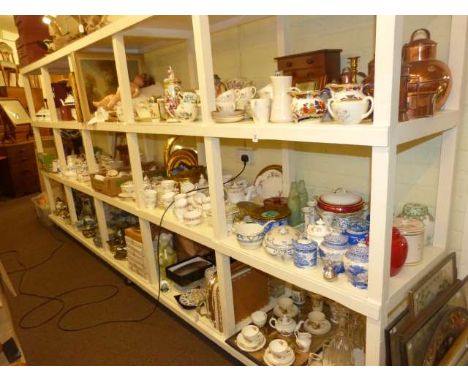 Full shelf of tea ware, jugs, Worcester tureens, brass coal helmet, ginger jars, etc