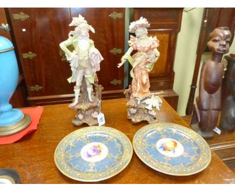 Pair Royal Worcester fruit painted and gilt plates, and pair of bisque figures
