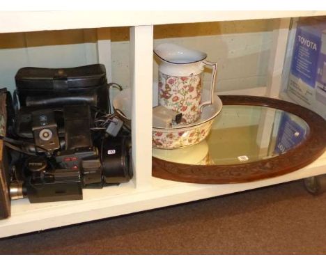Carved oval oak framed mirror, Toyota sewing machine, toilet jug and basin, cameras and equipment