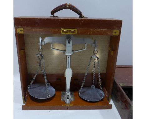 Two mahogany cased weighing scale by D.E Graves &amp; co with tambour fronts 