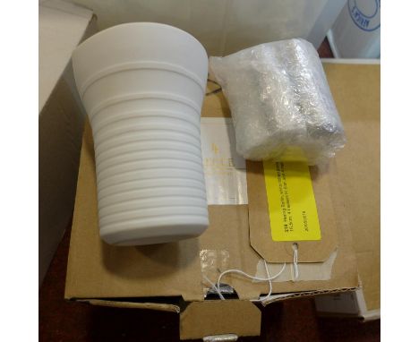 Hering Berlin, white ribbed porcelain Sake set: 1 vessel H: 15.5cm, 4 beakers H: 8cm and 4 matching chopstick rests) 