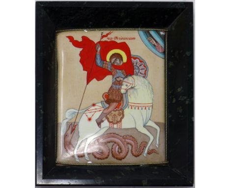 A late 19th century Russian enamel icon of St George Slaying the Dragon, in a marble frame (Damage to marble frame and chip t