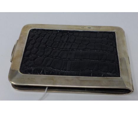 A Victorian silver and crocodile skin cheque book holder 