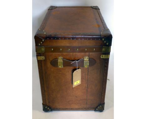 A vintage leather lamp table/trunk, H.59 W.51 D.46cm 