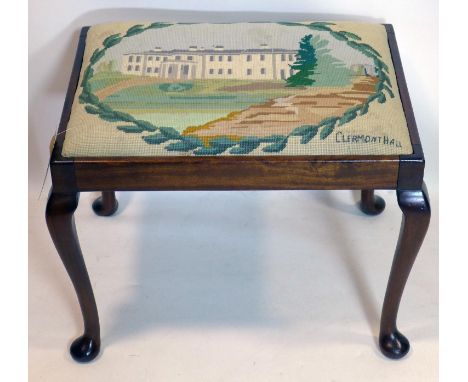A Georgian style mahogany stool, with tapestry upholstery raised on cabriole legs 