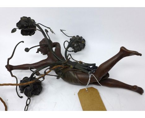 A late 19th century French spelter ceiling light in the form of a lady with bow and arrow 