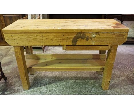 A Pine Work Bench, Raised on square legs, 88cm high, 138cm wide, 56cm deep