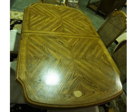 A Modern French Style Oak Pull Out Dining Table With Six Chairs, Including two carvers, Dining table 72cm high, 107cm long, 6