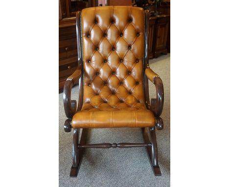 A Victorian Style Mahogany Rocking Chair, Upholstered in tan button back leather, 66cm high 