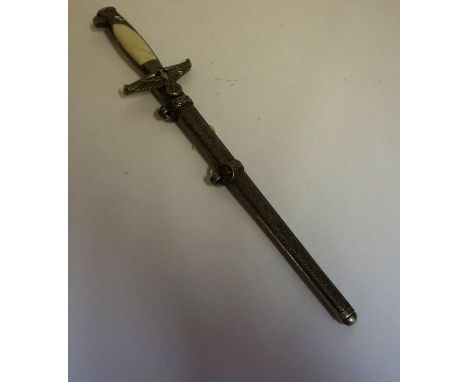 A Reproduction SS Dagger, blade 25cm long, in a metal scabbard