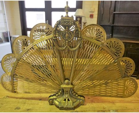 A Vintage Brass Fan Fire Screen, 69cm high, 97cm wide