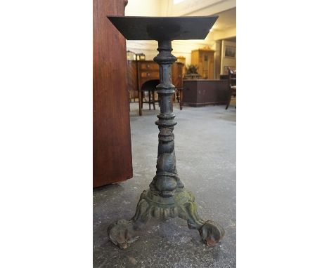 A Cast Iron Pub Table Base, Probably from a Manchester foundry, raised on shaped tripod feet, 68cm high, 28cm wide, 