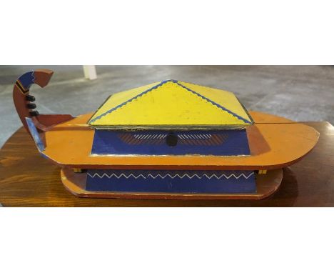 A Vintage Painted Pine Model of Noah,s Ark, the top cover enclosing various painted animals, 30cm high, 82cm long, 31cm wide