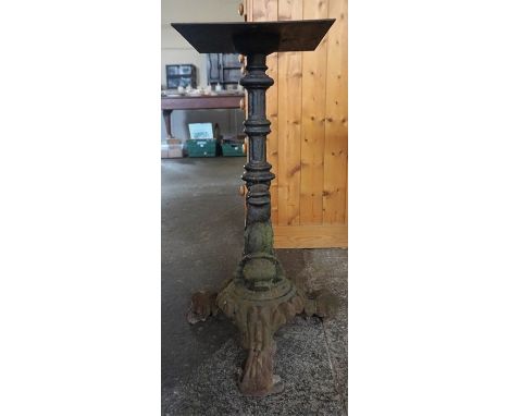 A Cast Iron Pub Table Base, Probably from a Manchester foundry, raised on shaped tripod feet, 68cm high, 28cm wide, 