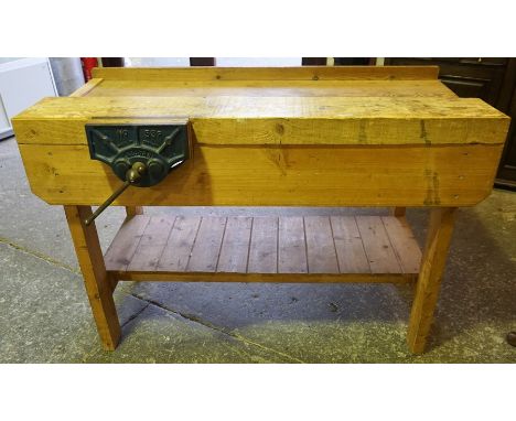 A Pine Work Bench, with attached vice by Record, no 92cm high, 136cm wide, 64cm deep