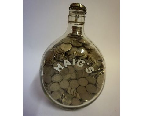 A Large Quantity of Pre-Decimal Sixpences, circa 1930-1960, approximately 1000 in total, enclosed in a vintage Haigs whisky b