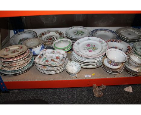 Shelf of china, plates, cups, serving dishes, etc. 