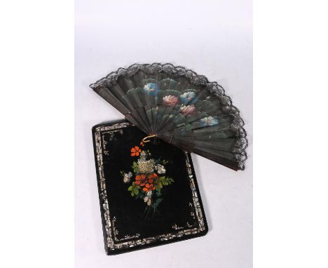 A papier machine blotter with mother-of-pearl, abalone and painted rose design, 30cm x 22cm and a similar fan. (2) #476 