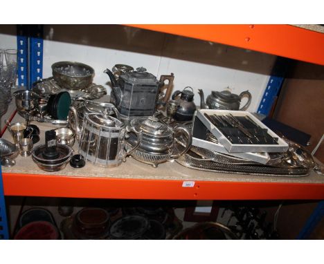 Shelf of EPNS to include teapots, trays, flatware,&nbsp; etc. 