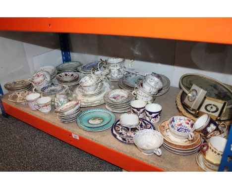 Shelf of assorted china to include tea cups, saucers, dishes, etc. 