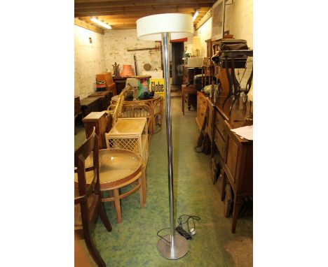Modern standard lamp with thin banded shade. 