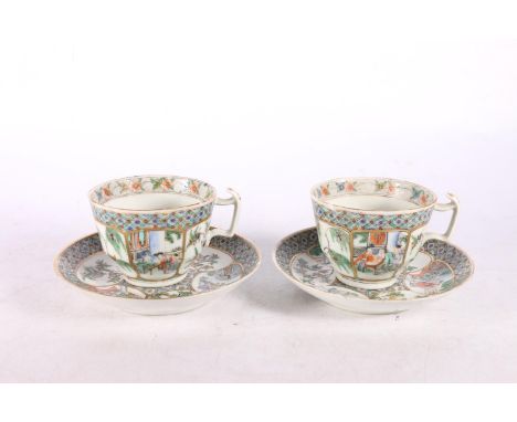 Pair of Chinese Canton porcelain cups and saucers decorated with figures and birds in trees. (2) #592 