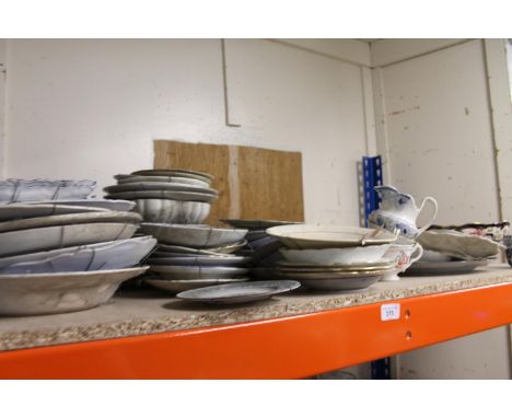 Shelf of china, blue and white, Wedgewood, cups, bowls, etc. 