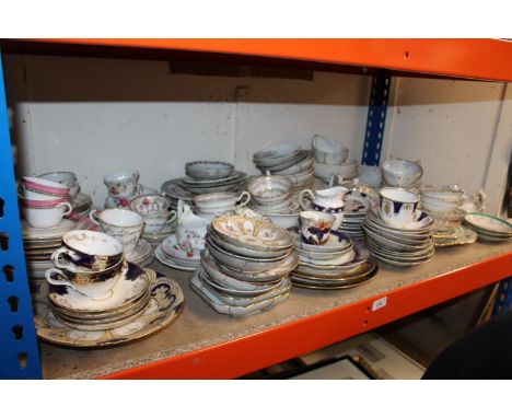 Shelf of china, cups, saucers, bowls, etc. 