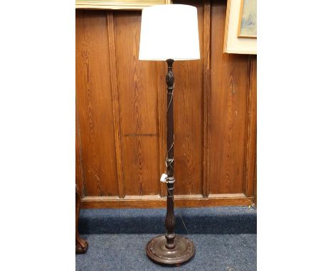 Mahogany turned and reeded standard lamp with cream shade, 134cm tall to top of fitting.  #101 