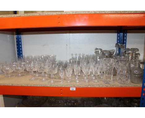 Shelf of glass to include brandy balloons, mugs, stemware, jugs, decanters, etc. 