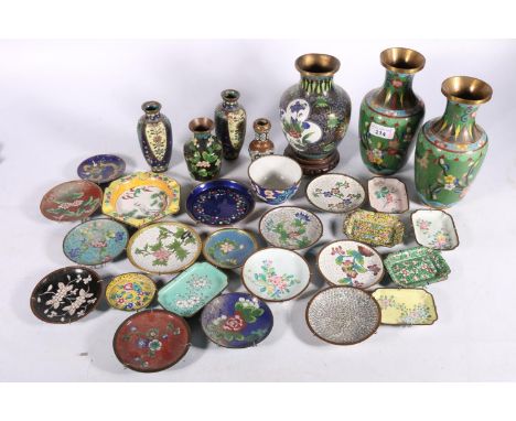 Cloisonné enamel ware to include a pair of vases, 20cm high, five others smaller, numerous Chinese cloisonné pin trays, etc.&
