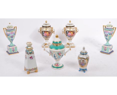 A small collection of porcelain miniature vases / urns etc. to include: a pair of Italian style lidded pot-pourri vases with 