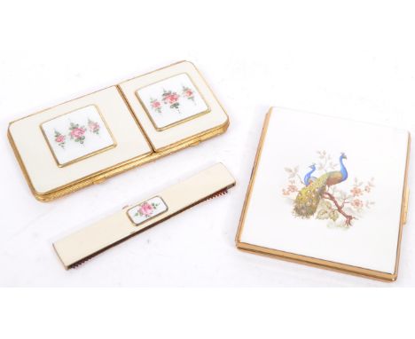 Two vintage 20th century compacts and cigarette cases. To include 1920s&nbsp; 24K gold plated and enamel dual cigarette and c