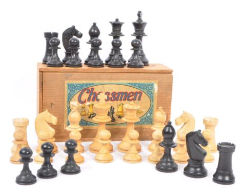 A vintage 20th century Chessmen chess pieces by K &amp; C Ltd, London. Wooden chess pieces of turned construction, housed wit