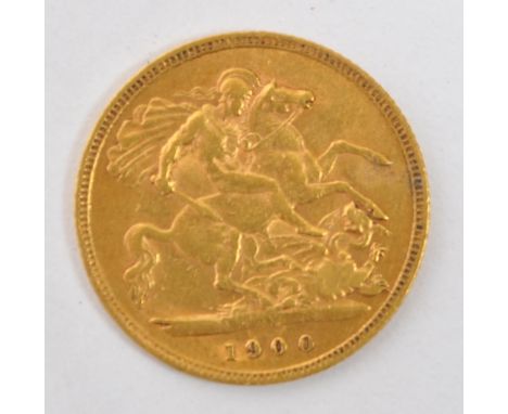 A 1900 Queen Victoria 22CT gold half sovereign and issued by the Royal Mint. The obverse was designed by Thomas Brock and fea