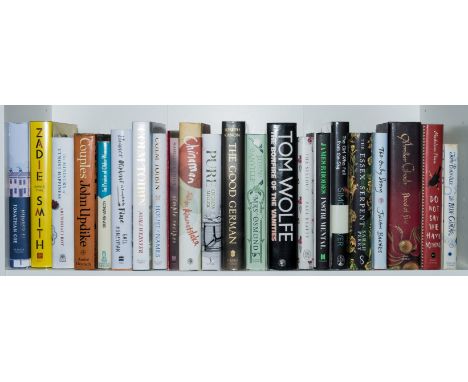 Wolfe (Tom) The Bonfire of the Vanities, signed by the author, jacket price-clipped, light fading to spine, 1988 § Updike (Jo