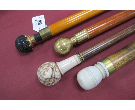 A Snooker Cue Walking Cane with Faux Ivory Top, painted with birds and flowers, terminating into a large brass tip 88cm long,