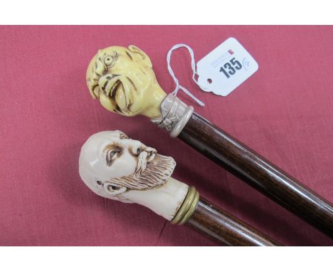 A Grotesque Faced Resin Walking Cane Handled Walking Stick, with 925 sliver collar, 92cm long, and another resin headed handl