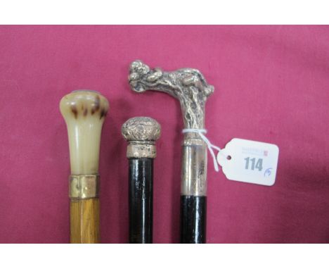 A Walking Cane with White Metal Handle in the Form of a Sleeping Cherub/Boy on The Branch of a Tree, 95cm long and a hexagona