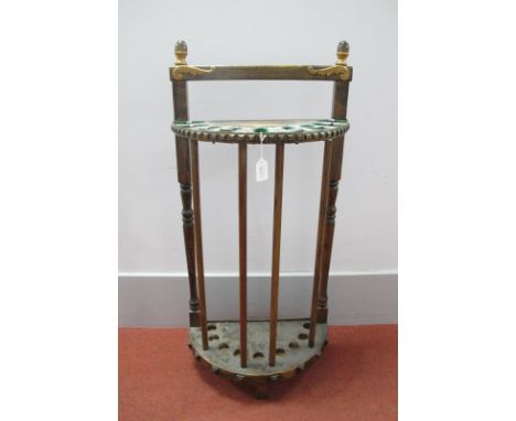 A Stick Stand in Half Circle, finial's to top holds eighteen canes, raised on three legs, 80cm, high x 45cm wide x 23cm deep.