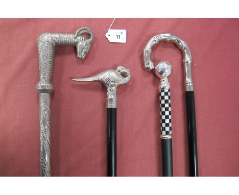 Four White Metal Handled Sticks, including bent cane, duck, checkered handle and a full metal stick with ram's head, all appr