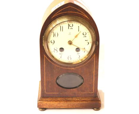 Edwardian inlaid mahogany mantel clock of Lancet form, enamelled dial and bevelled display panel, H: 29 cm. Not available for