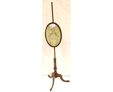 19th century walnut framed pole-screen, with an Oriental inspired embroidered silk oval panel raised on a tripod base, overal