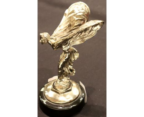 Spirit of Ecstasy car bonnet mascot on a ceramic base, H: 16 cm. P&amp;P Group 2 (£18+VAT for the first lot and £3+VAT for su